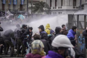 Una fotógrafa fue herida durante la represión en el Congreso